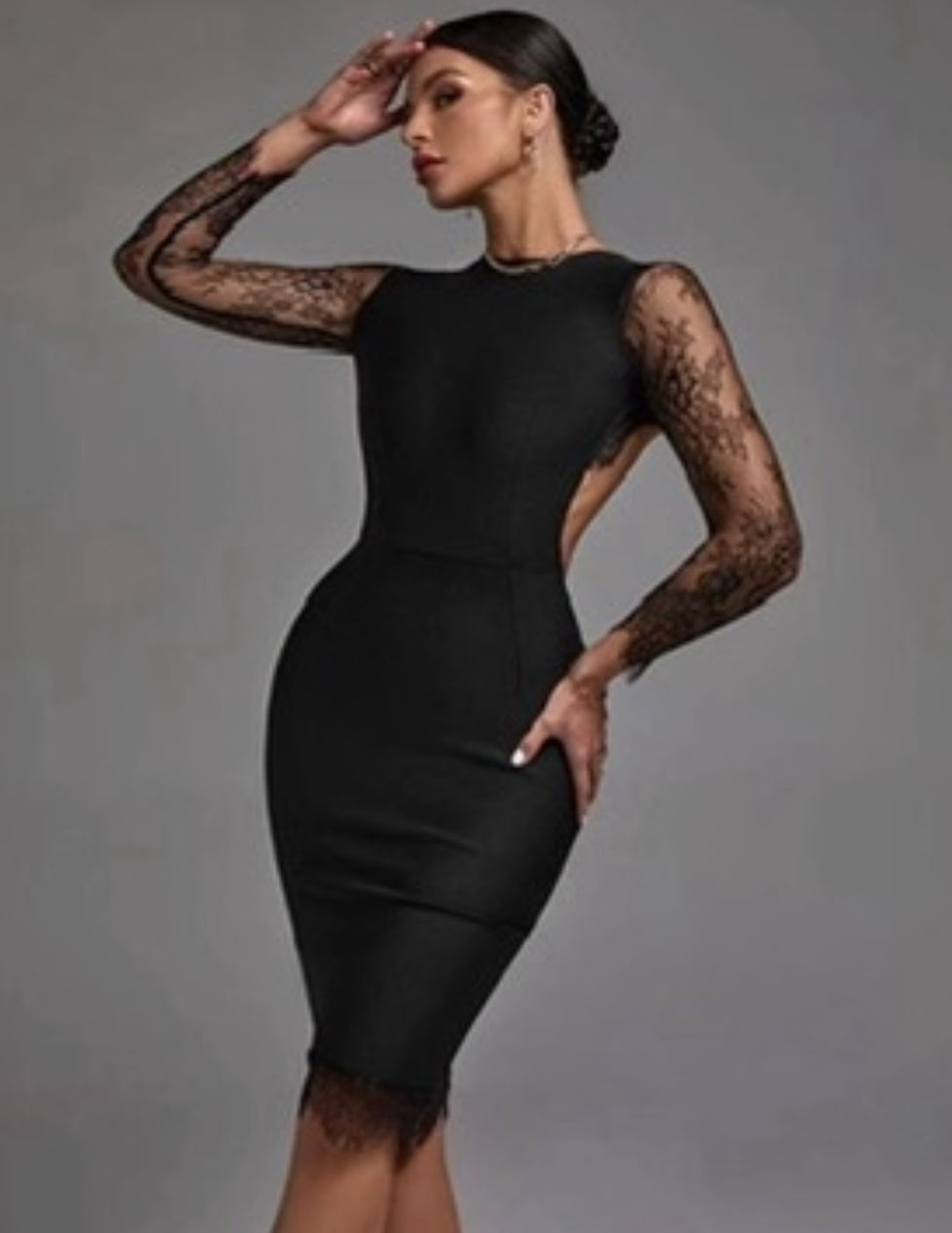 Tubino Lara con schiena scoperta con pizzo e merletto elegante e seducente