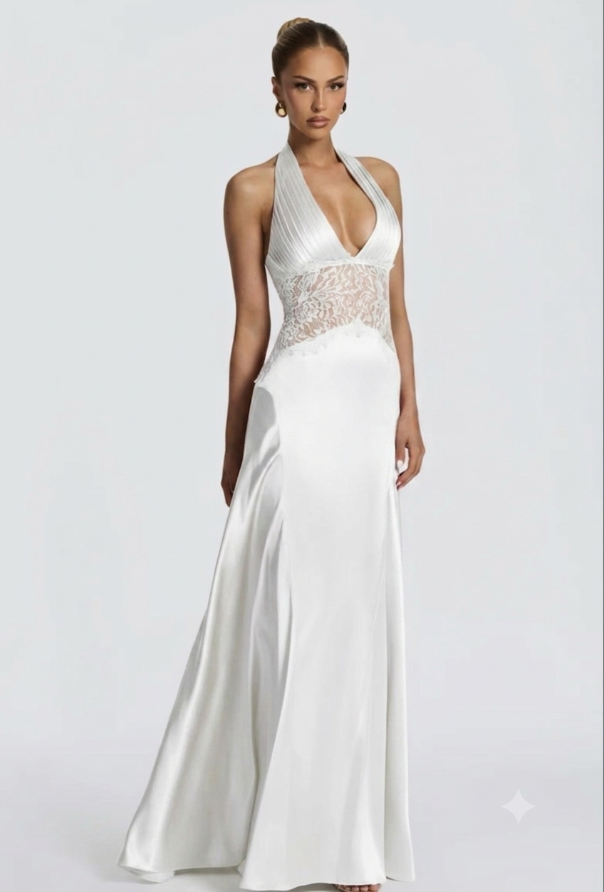 Abito Incanto Lasciati conquistare dall'eleganza fluida di un abito studiato per valorizzare ogni silhouette con una grazia senza tempo. Perfetto per le serate più esclusive, i gala e gli eventi indimenticabili.