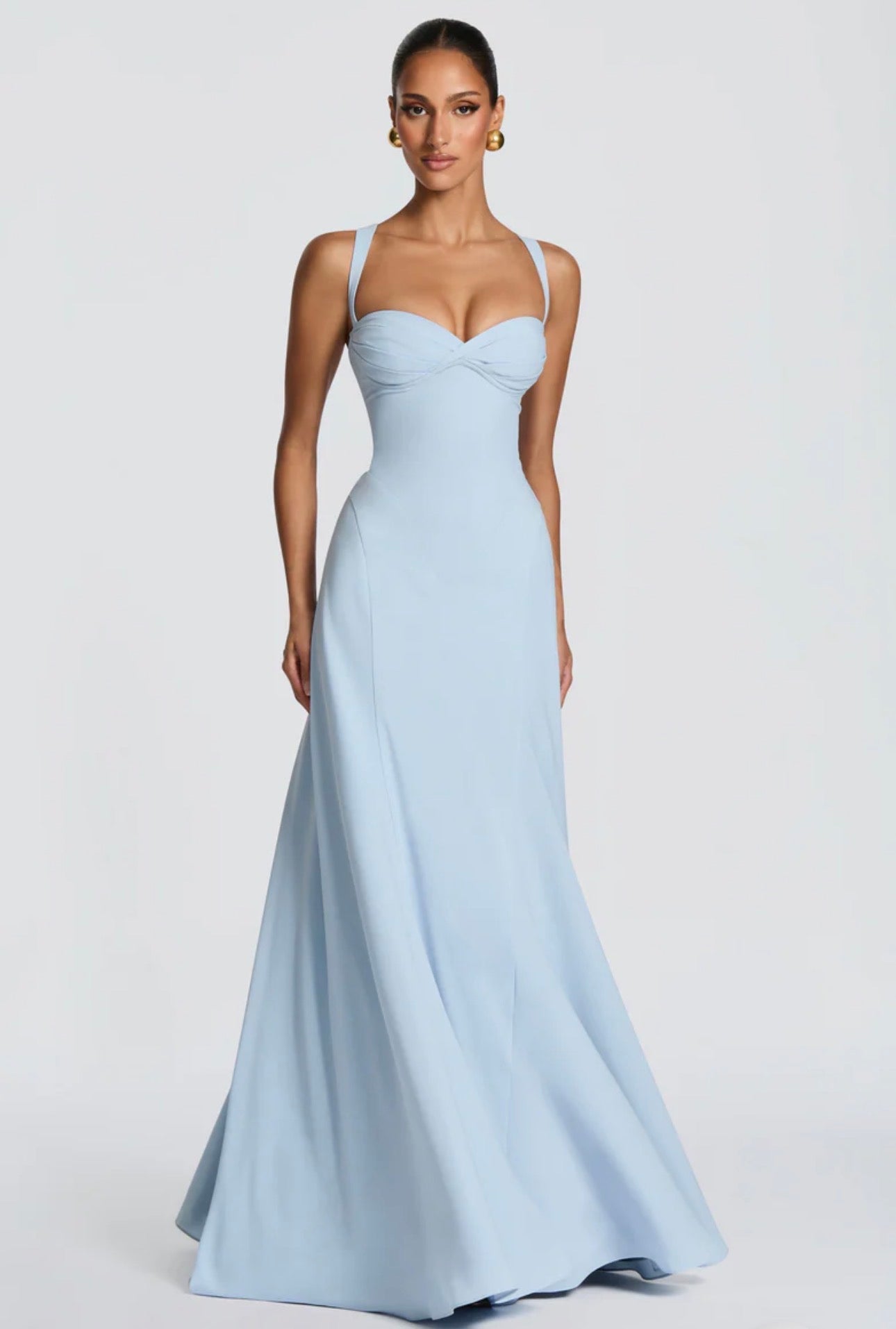 Abito Lungo Aura Corset Elegante ed esclusivo, l'abito lungo Aura ridefinisce la silhouette femminile con un corsetto delicato e spalline incrociate sul retro.